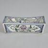 A Chinese Blue and Famille Verte Porcelain Pillow