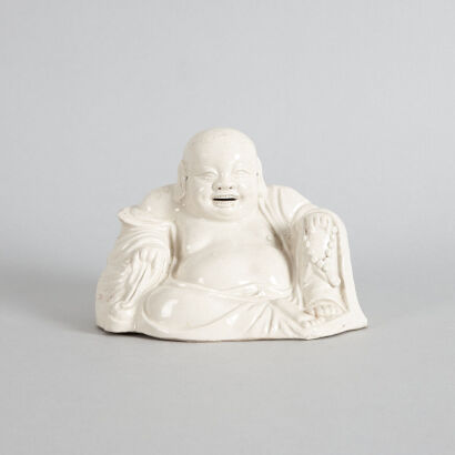 An Early 20th Century White-Glazed Buddha