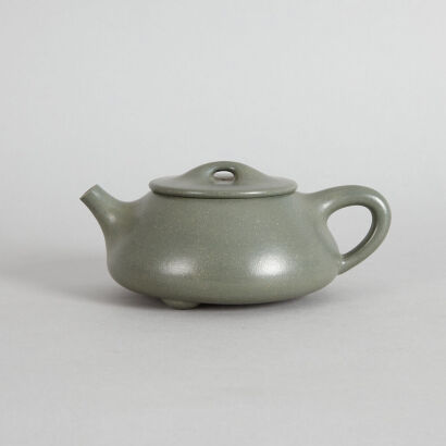 A Chinese Republic Period Green Clay Teapot (Yuan Ronggen Mark)