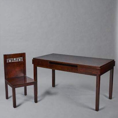 A Set of Dark Wooden Table and Chair