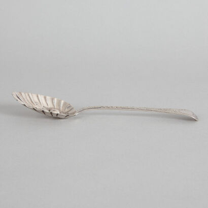 A Sterling Silver Spoon with Moulded Relief of Fruit