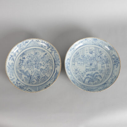 A Pair of Chinese Blue and White 'Figural' Saucers