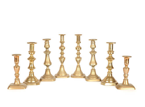 4 Pairs of Brass Candlesticks