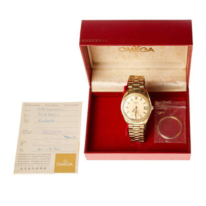 A Gentlemans Gold Plated Seamaster Wristwatch, Omega. Quartz. 36mm. Circular Gold dial with gold and black batons. Date aperature at 3 o'clock. Caseback, crown and clasp signed. Box and papers and extra plexiglass included.