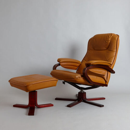 A Danish Mid-Century Swivel Armchair and Ottoman