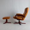 A Danish Mid-Century Swivel Armchair and Ottoman - 2