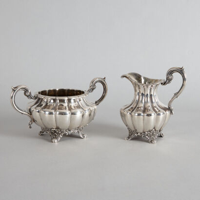 A Large Sterling Silver Sugar Bowl and Creamer