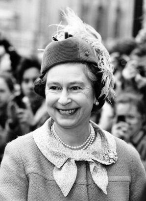 Smiling Queen with Feathered Hat