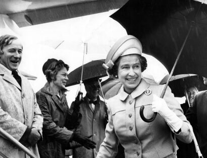 The Queen Smiles Despite the Rain, Wellington