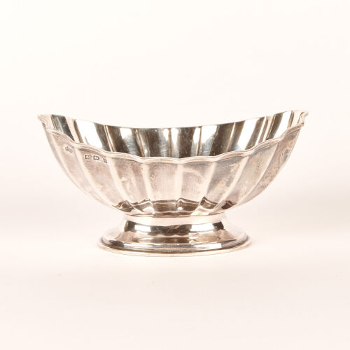 A Sterling Silver Scallop Shaped Sugar Basin