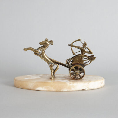 A Cast Brass Art Deco Rider and Chariot