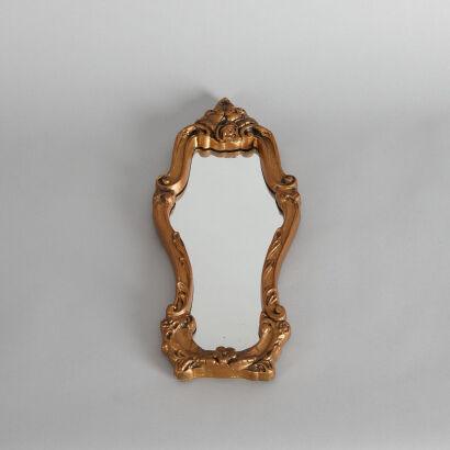 A Gold Plaster Framed Mirror