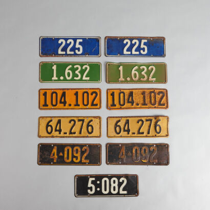 Eleven Vintage License Plates