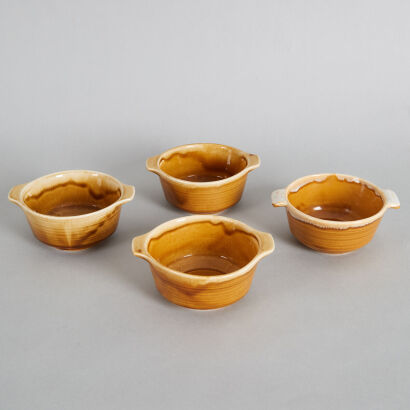 A Set of Four Crown Lynn Honey Glaze Bowls