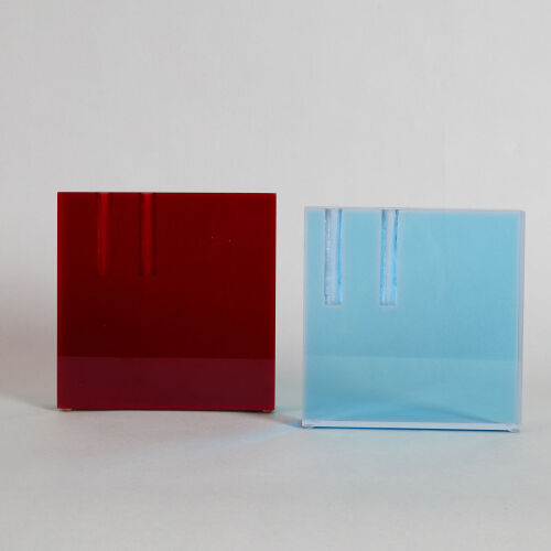 A Pair of Lucite Vases