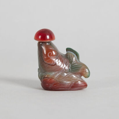 A Chinese Green Jade Carved Snuff Bottle