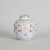 A Chinese White-ground Famille Rose Lidded Jar
