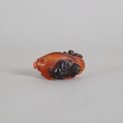 A Chinese Double-overlay Peking Glass Fish-shaped Snuff Bottle