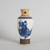 A Chinese Qing Dynasty Rust-glazed Blue and White 'Figural' Vase
