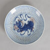 A Chinese Mid Qing Dynasty Underglaze-red and Blue 'Lion' Saucer