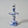 A Chinese Late Qing Dynasty Blue and White Altar Candlestick (repair to the base, Man Tang Fu Ji Mark)