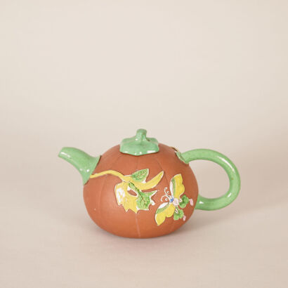A Chinese Late Qing Dynasty Coloured Red Clay Melon-Shaped Teapot