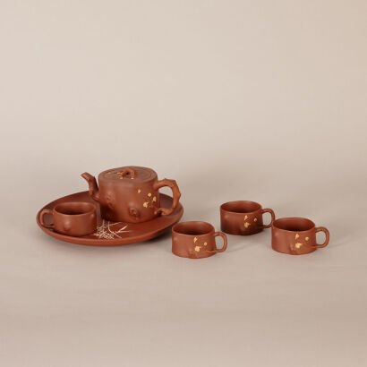 A Chinese Red Clay 'Prunus' Tea Set