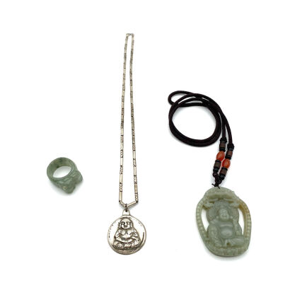 A Chinese Jade Carved Guanyin, A Jade Carved Ring & A Buddha Pendant