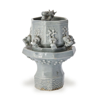 A Chinese Qing Dynasty Celadon Incense Burner decorated with 9 dragons