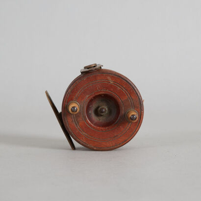 A Vintage Wood and Brass Fly Reel