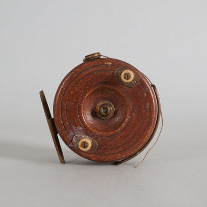 A Vintage Wood and Brass Fly Reel