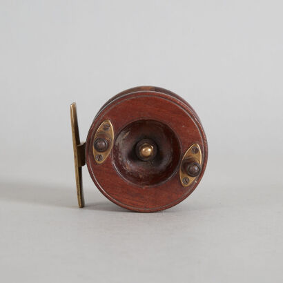 A Vintage Wood and Brass Fly Reel