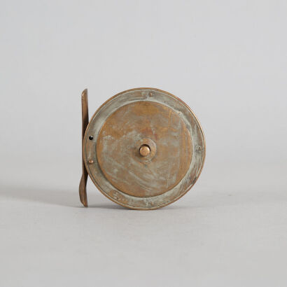 A Vintage A & W McCarthy Brass Fly Reel