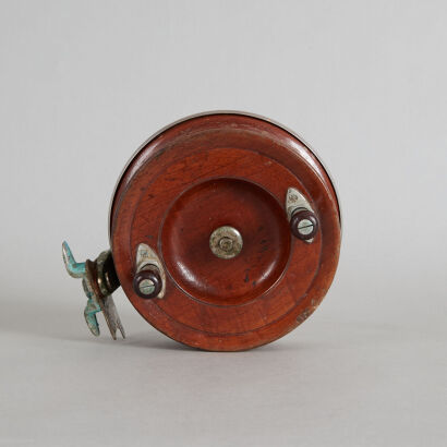 A Vintage Alvey Wood and Steel Fly Reel