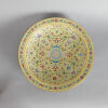 A Chinese Yellow-ground Famille Rose 'Eight Auspicious Emblems' Charger (Da Qing Daoguang Nian Zhi Mark)