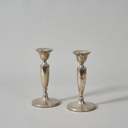 A Pair of Sterling Silver Candlesticks