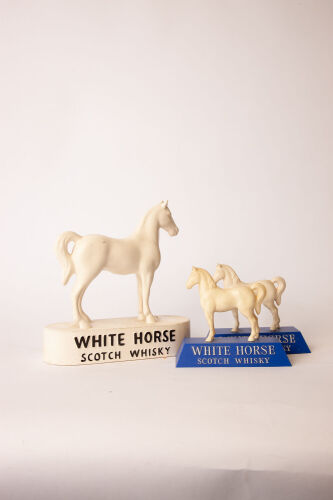 Three White Horse Whisky figurines in one lot