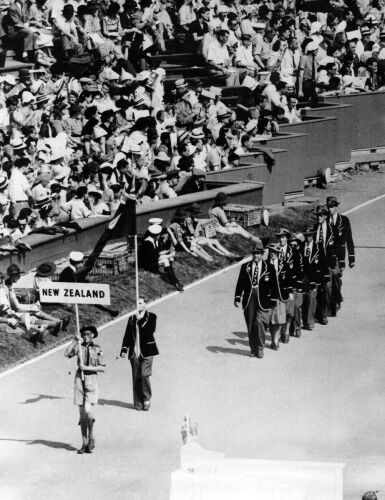 The New Zealand contingent march past King George VI during the opening ceremony at Wembley Stadium, 1948