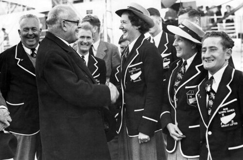 W.J. Jordan, High Commissioner for New Zealand, welcomes the team on their arrival at Tilbury, on board the S.S. Port Hobart in London, 1948