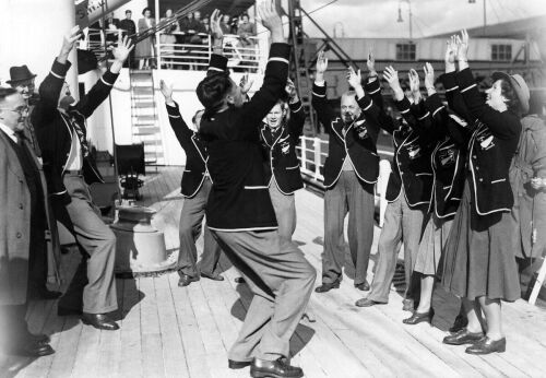 Members of the Olympic team perform the Haka War Chant aboard the S.S. Port Hobart upon their arrival in London, 1948