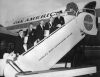 New Zealand athletes Peter Snell, Gary Philpott, Murray Halberg, Barry Magee, and coach Arthur Lydiard depart from Whenuapai, 1961