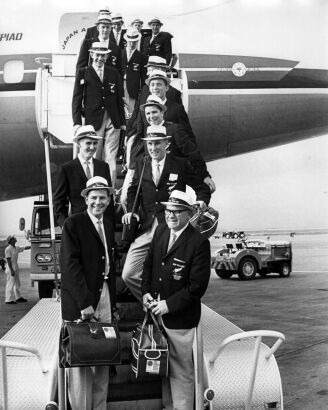 Members of the New Zealand Olympic rowing team arrive at Tokyo airport, 1964