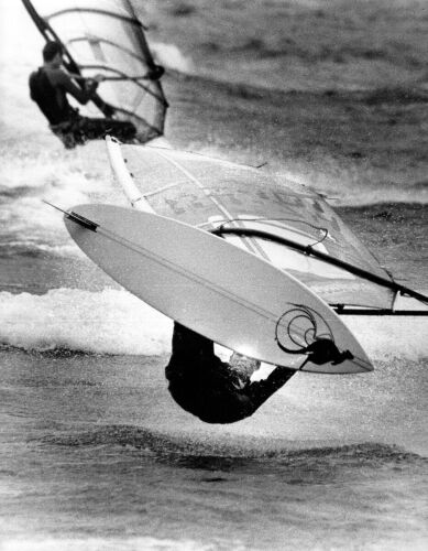 SIMON TOWNSLEY Olympic gold medal sailboard rider Bruce Kendall competing at the New Zealand Slalom Board Championships at Plimmerton, 1987