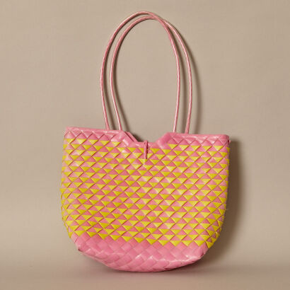 A Small Pink and Yellow Woven Bag