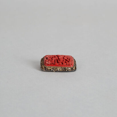 A Chinese Silver and Red Lacquer 'Fortune' Brooch