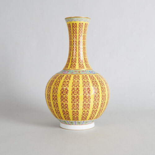 A Chinese Yellow-ground Famille Rose 'Shuangxi' and 'Longevity' Bottle Vase (Da Qing Guangxu Nian Zhi Mark)