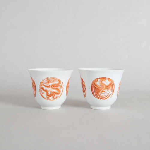 A Chinese Qing Dynasty Guangxu Period Iron-red 'Dragon and Phoenix' Medallion Cups (Da Qing Guangxu Nian Zhi Mark)