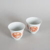 A Chinese Qing Dynasty Guangxu Period Iron-red 'Dragon and Phoenix' Medallion Cups (Da Qing Guangxu Nian Zhi Mark) - 2