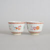 A Pair of Chinese Famille Rose 'Auspicious' Cups (Da Qing Tongzhi Nian Zhi Mark)