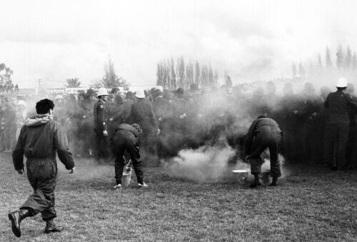 Smoke canisters set off by protesters during a demonstration